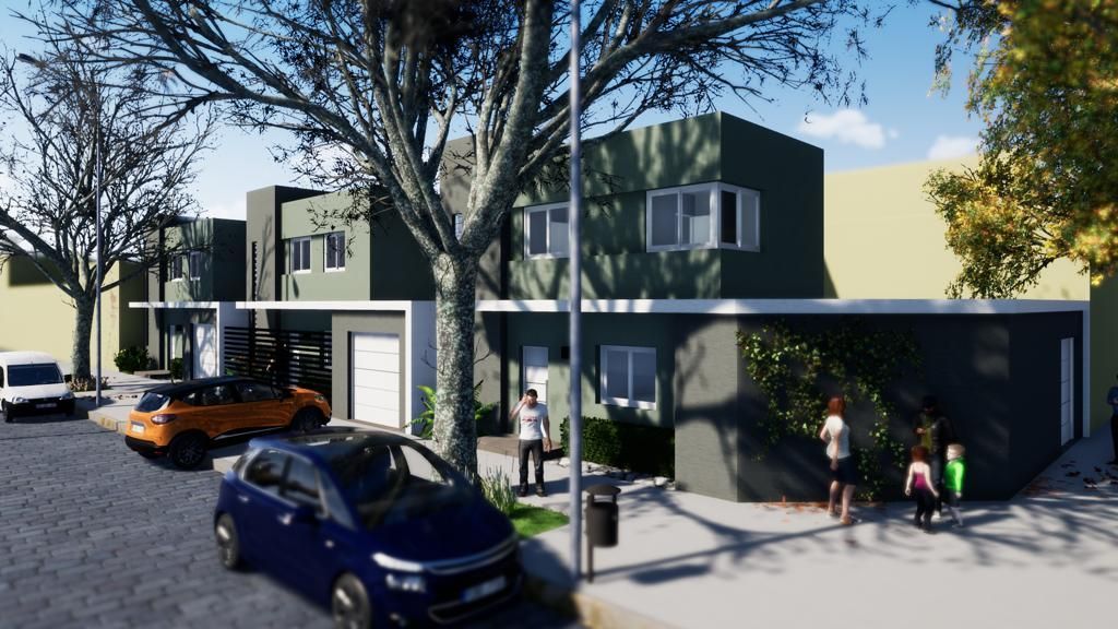 Casas adosadas con coches, árboles y gente en la acera.