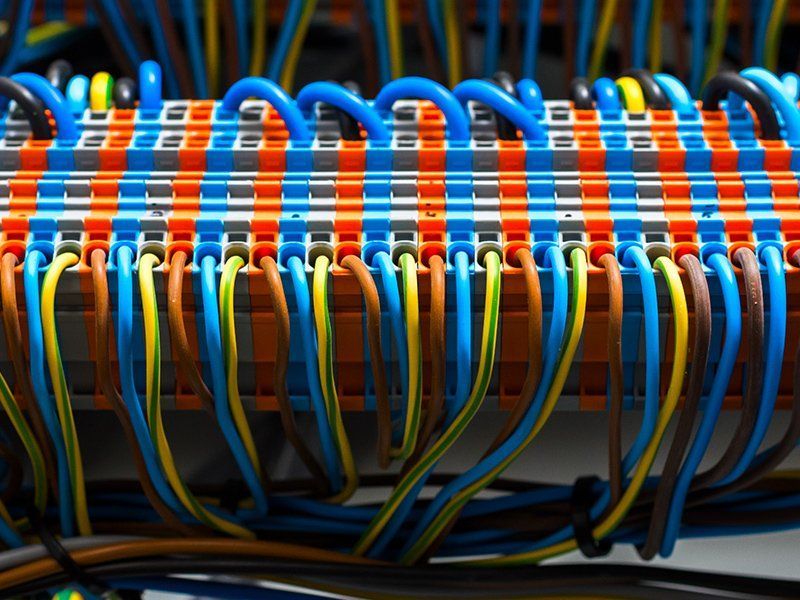 A bunch of wires are connected to each other in a row.