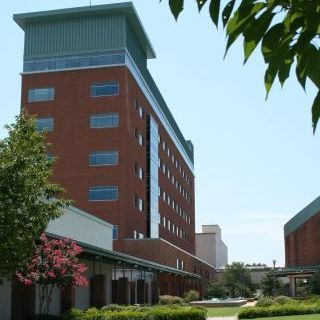 A large brick building with a lot of windows
