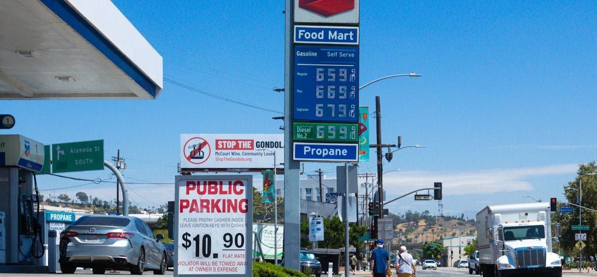 A gas station with a sign that says 2 on it