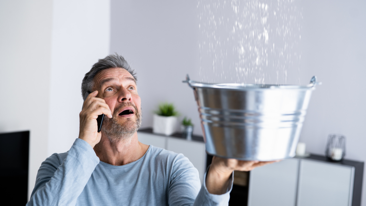 Man holding bucket.