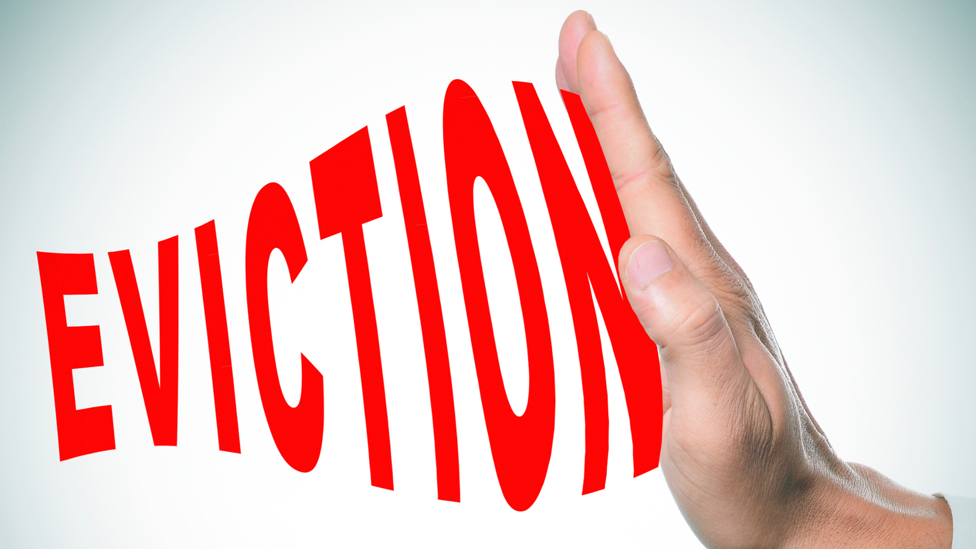 Hand blocking eviction text representing Florida eviction defense and landlord legal protection