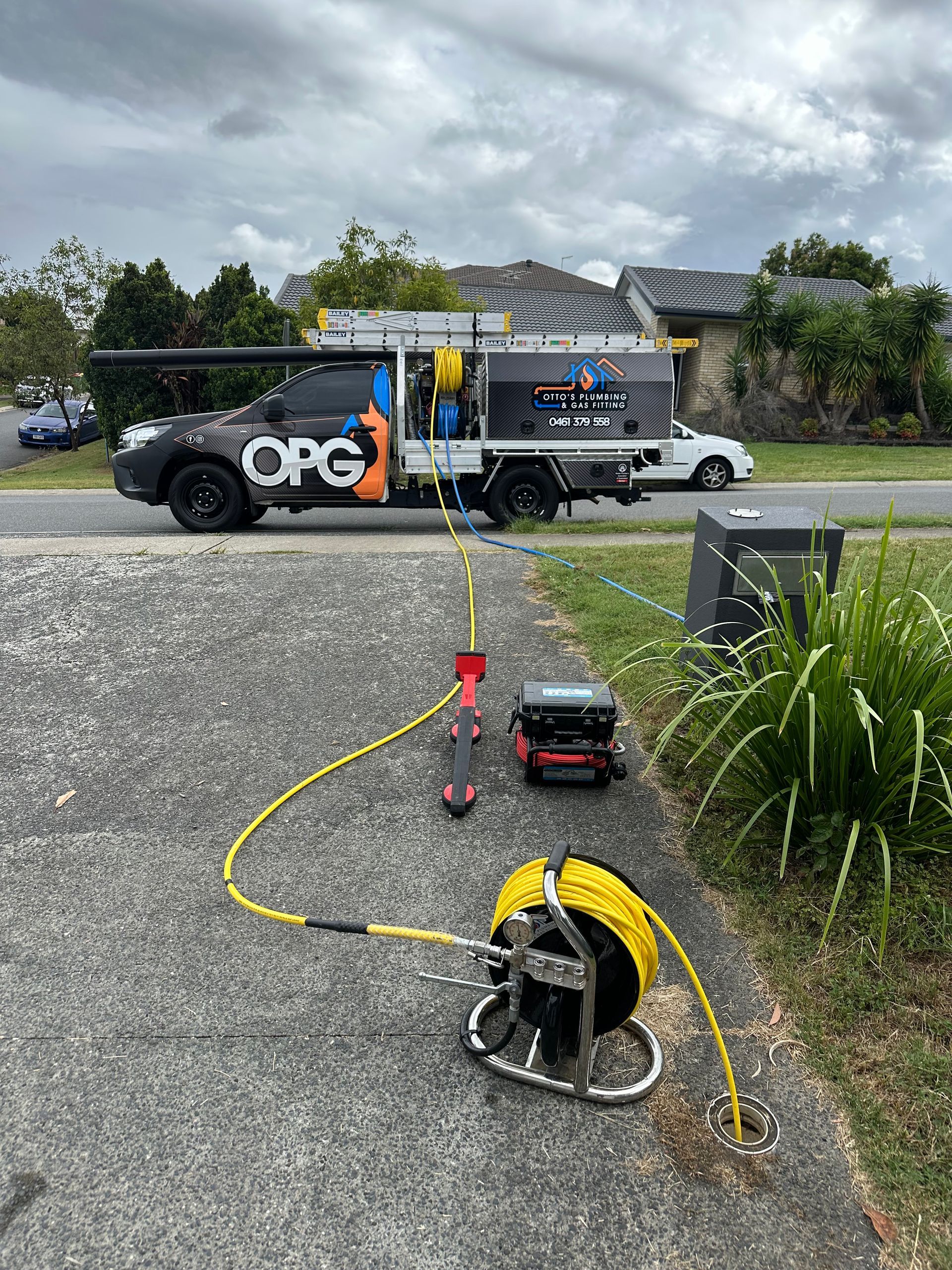 A Car With Leads Is Unblocking a Drain — Otto’s Plumbing & Gasfitting in McDowall, QLD