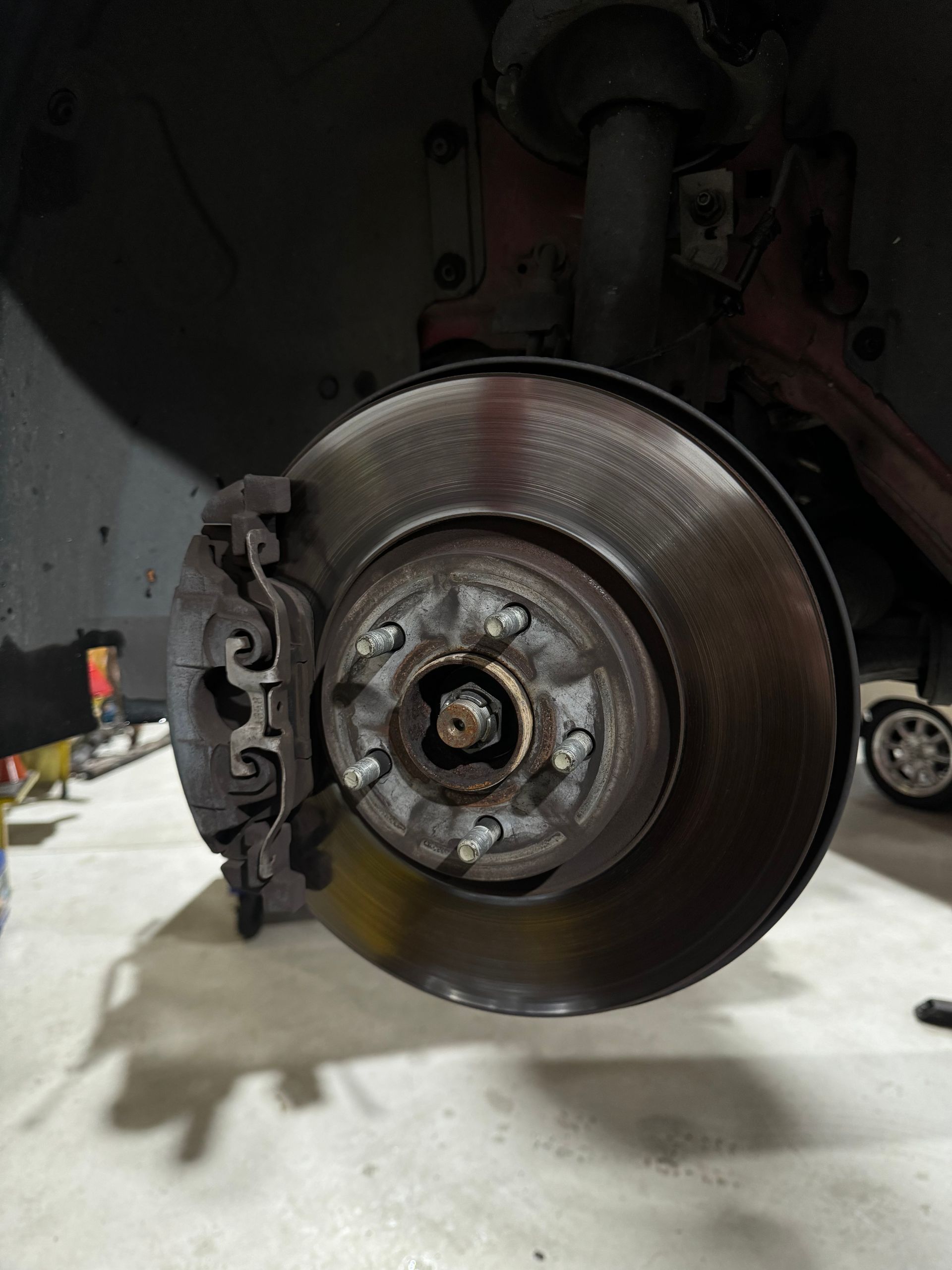 A close up of a brake disc on a car. — HO Performance in Cleveland, QLD