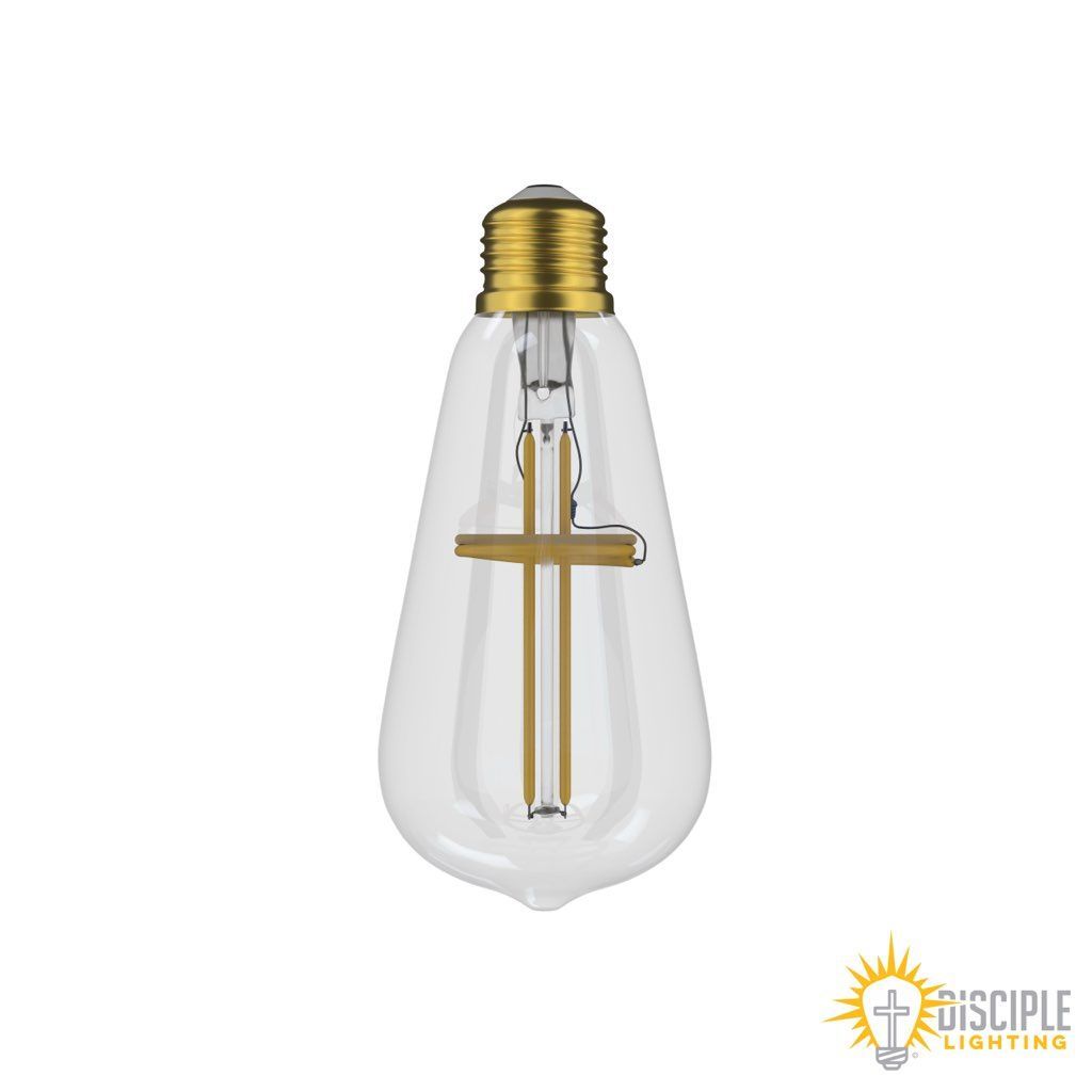 Clear teardrop-shaped lightbulb with a gold cross inside and a gold base.