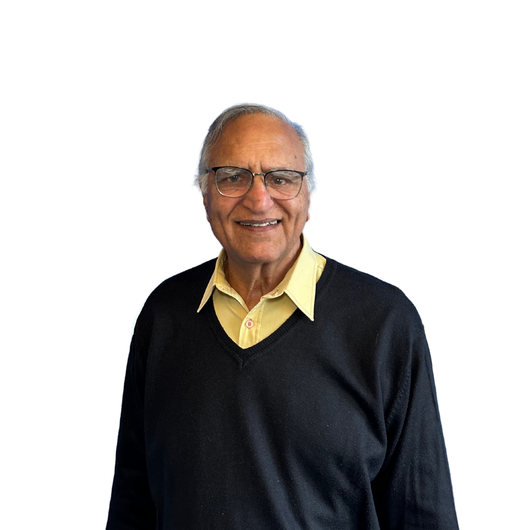 An older man wearing glasses and a black sweater