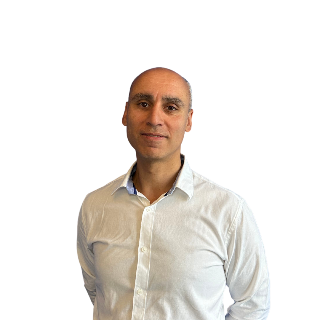 A man in a white shirt is standing in front of a white background