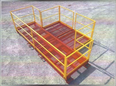 Yellow metal work platform with red mesh flooring and guardrails.
