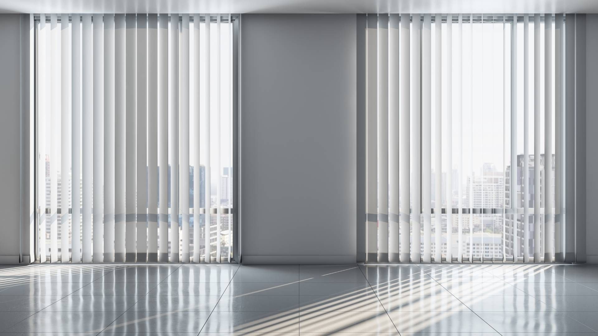 Vertical blinds for two large windows with a view of a city skyline at My Blind Spot near Virginia B