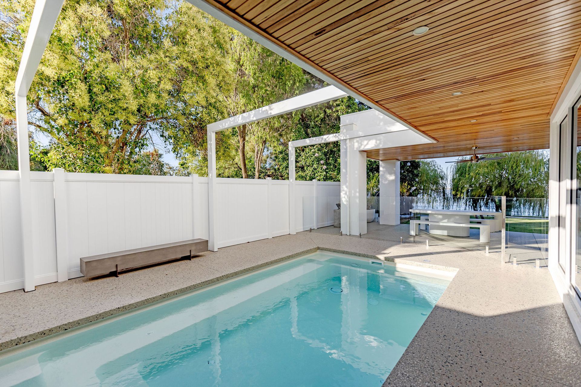 Pool Area With a Rectangular Pool and Concrete Patio — Swan Hill Pool & Spa Centre in Swan Hill, VIC