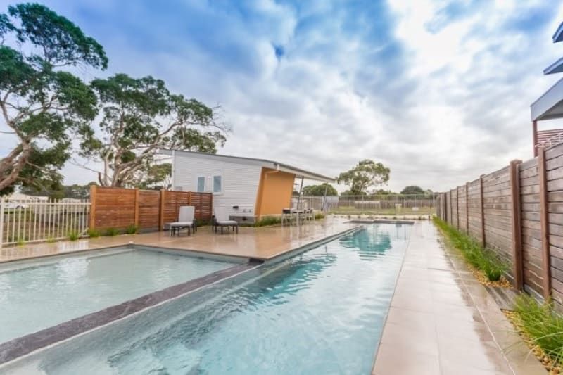 Swimming Pool with Wood Fencing — Swan Hill Pool & Spa Centre in Swan Hill, VIC
