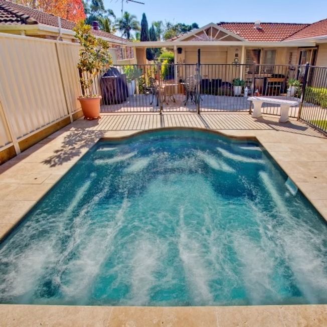 A Small Turquoise Pool with A Bubbling Fountain — Swan Hill Pool & Spa Centre in Swan Hill, VIC