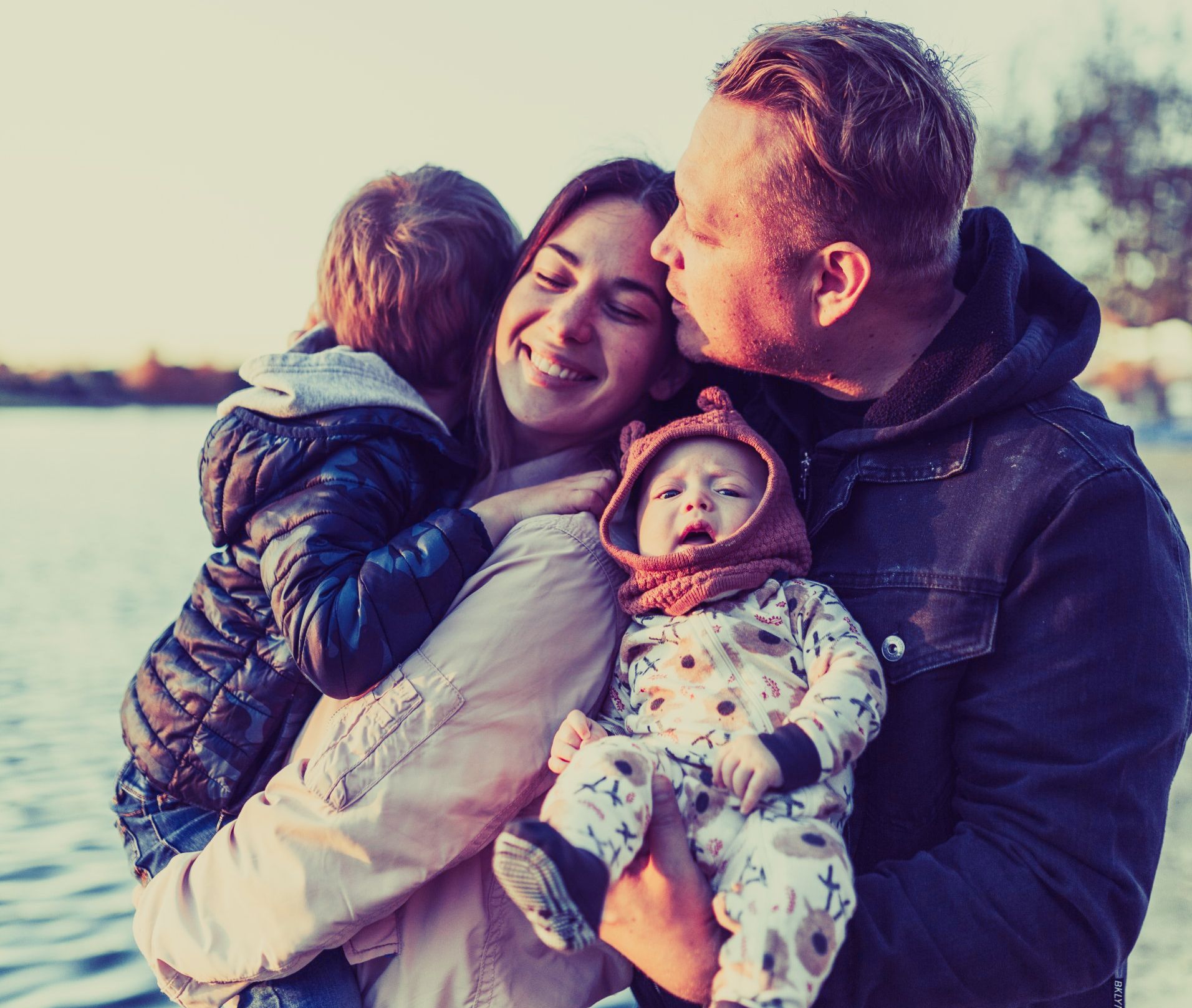 Family enjoying time together after receiving postpartum doula support