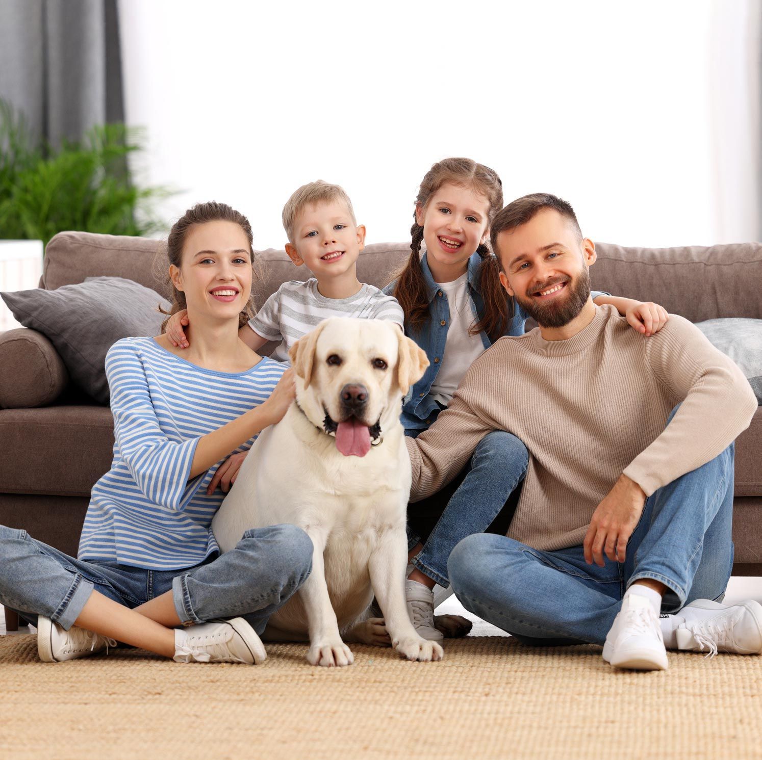 Happy Family With Dog — Randleman, NC — Evans Air Services Inc.
