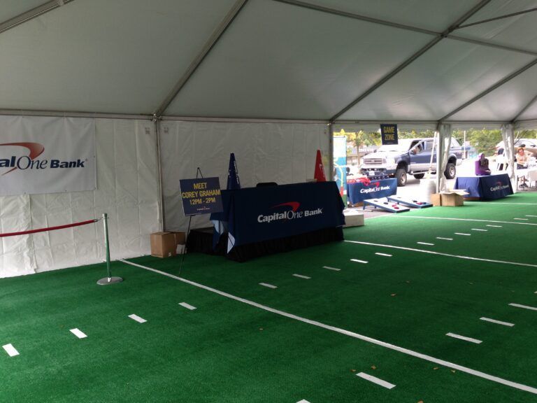 A Table With Capital One Bank Written on It