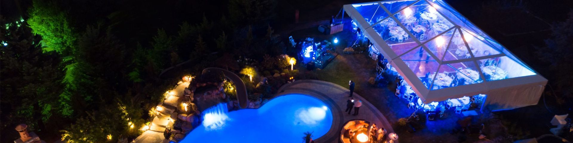 An Aerial View of a Large Swimming Pool at Night