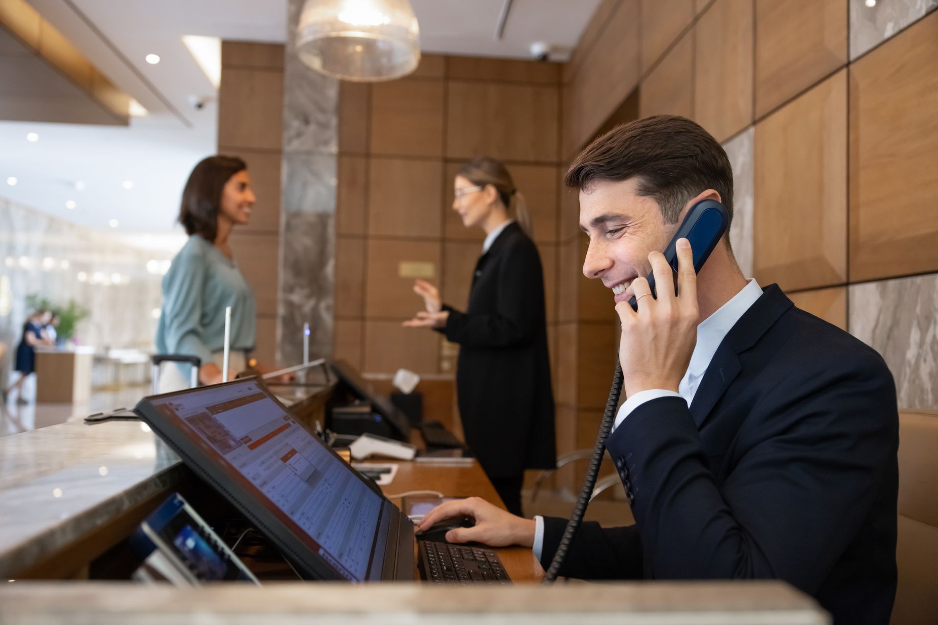 Professional phone interaction representing consistent brand trust experiences