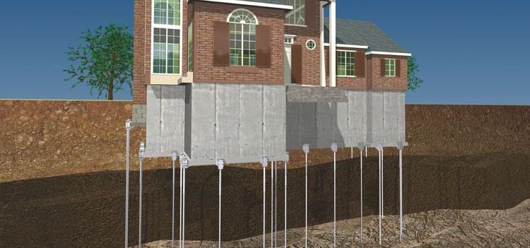 Digital Illustration of a home with push piers below the surface