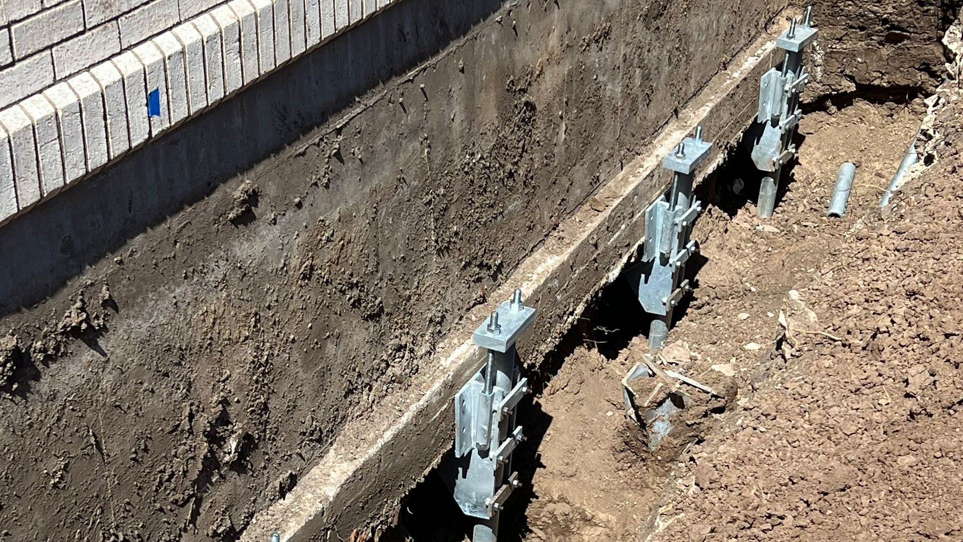 photo of commercial helical piers installation