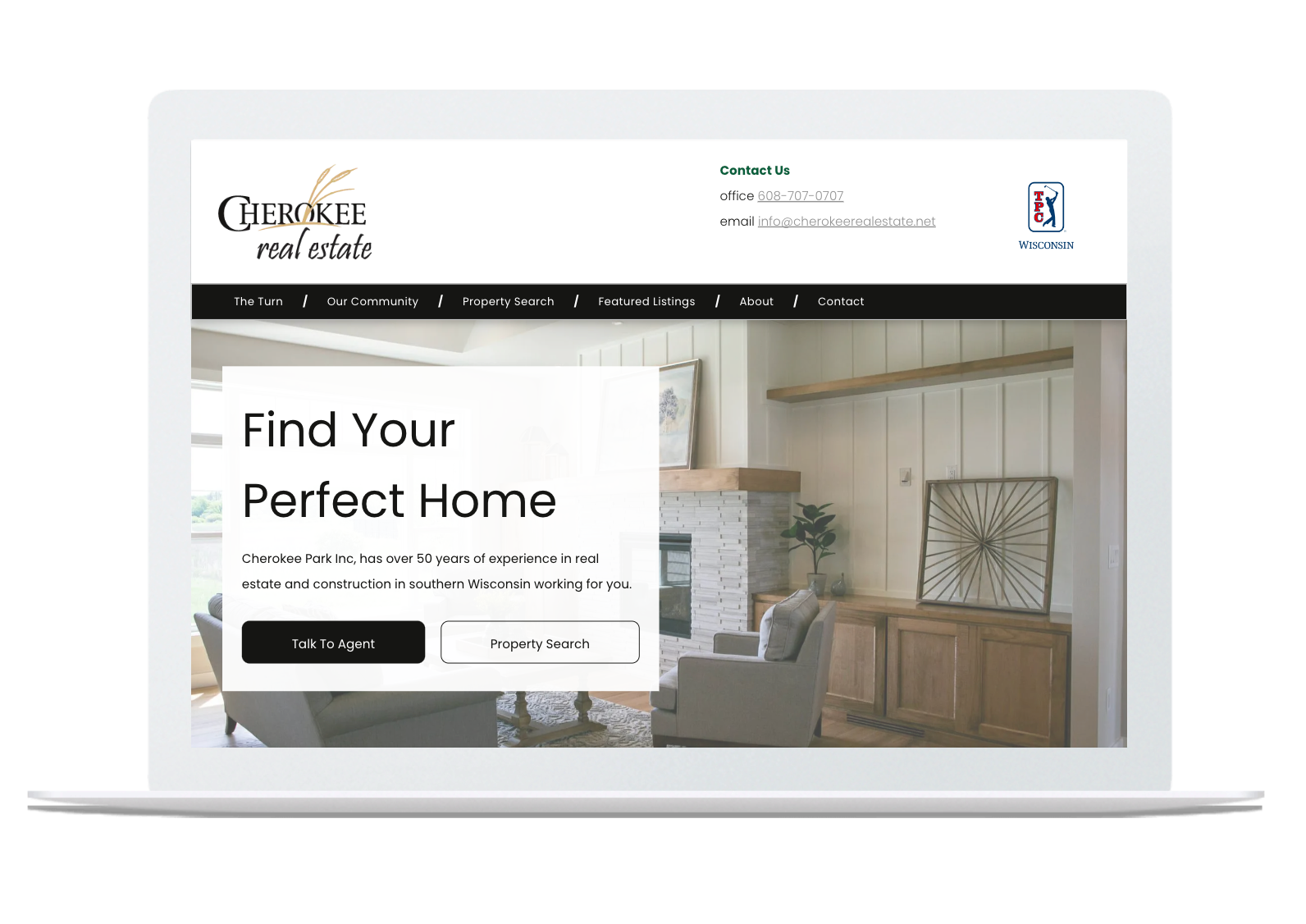 A laptop is open to a website that says `` find your perfect home ''.