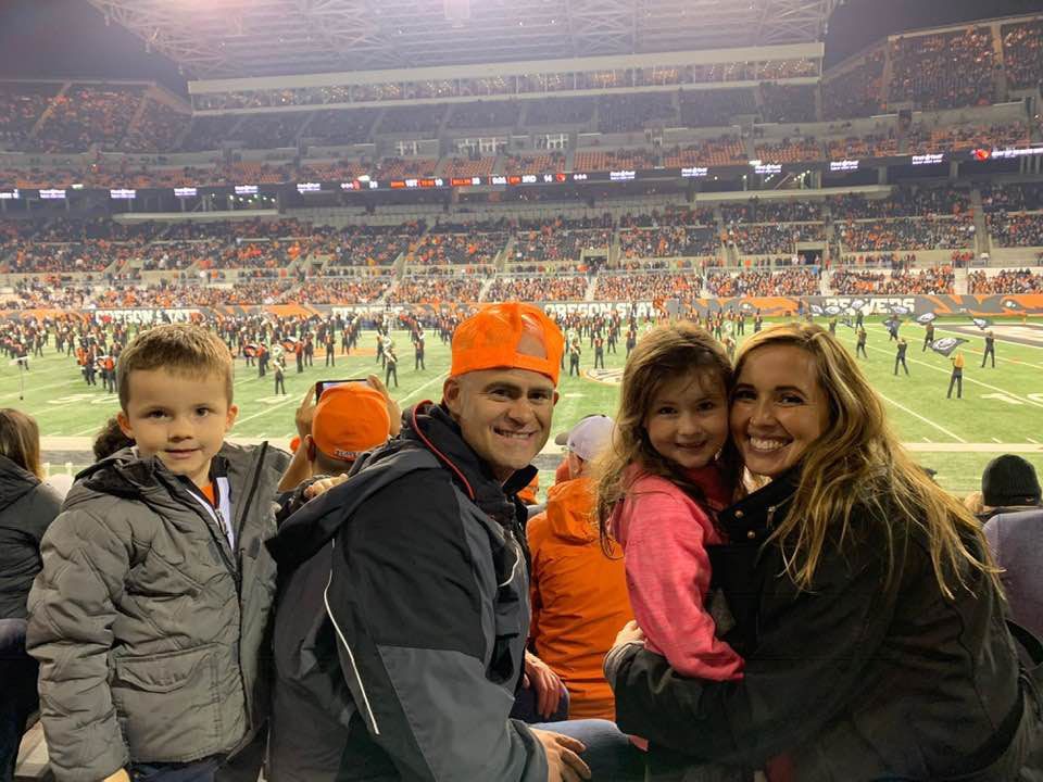 Tye and Ann Rustrum at their Alum Oregon State University watching a football game