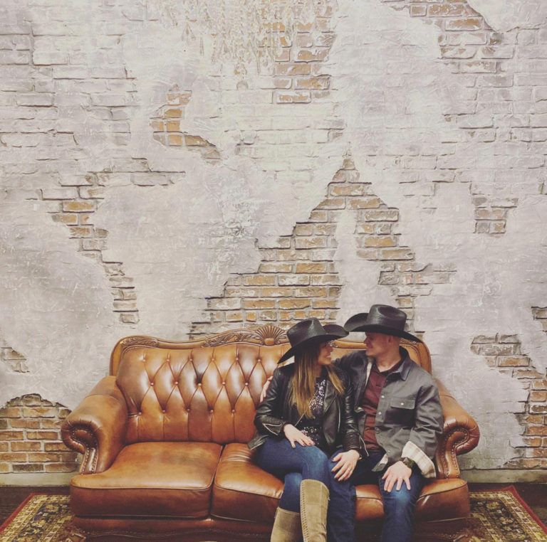 Tye and Ann in photo dressed in western attire