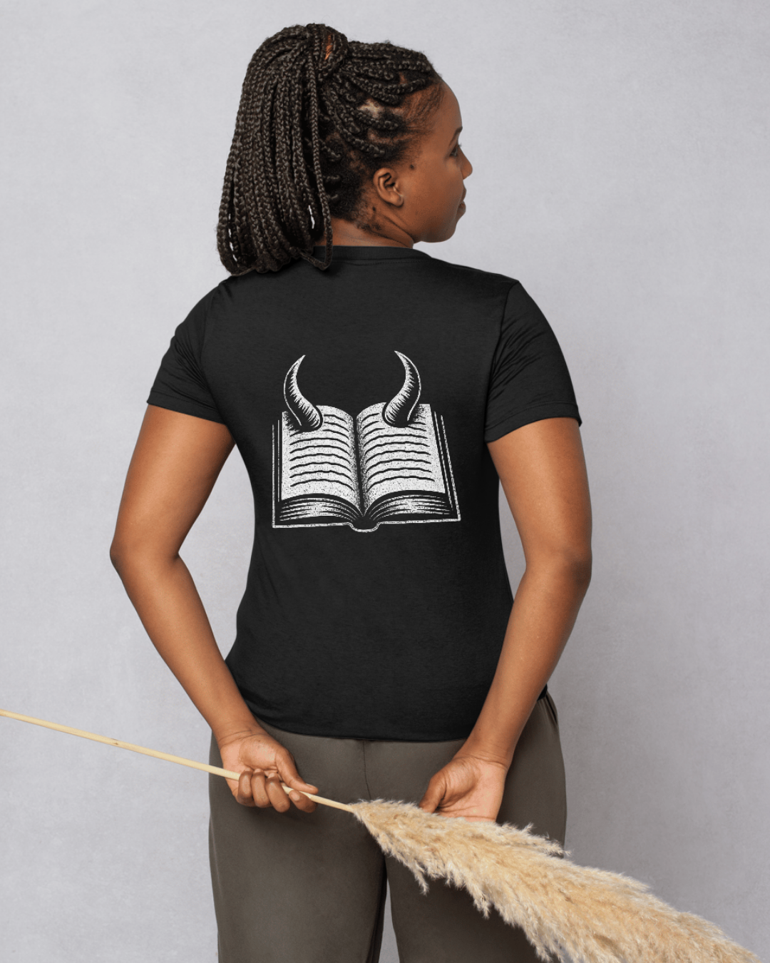 Smut & Sin black unisex t-shirt with open book and devil horns graphic on the back, 50% cotton 50% polyester blend