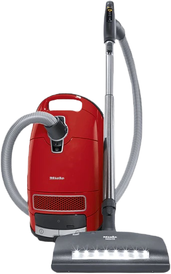 a red vacuum cleaner with a hose attached to it | Sewing Machine Repair — Orange County, California — Capistrano Vacuum & Sewing Center
