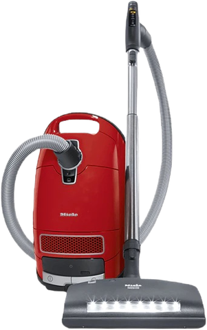 a red vacuum cleaner with a hose attached to it | Sewing Machine Repair — Orange County, California — Capistrano Vacuum & Sewing Center