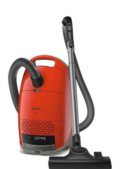 a black vacuum cleaner with a hose attached to it | Sewing Machine Repair — Orange County, California — Capistrano Vacuum & Sewing Center