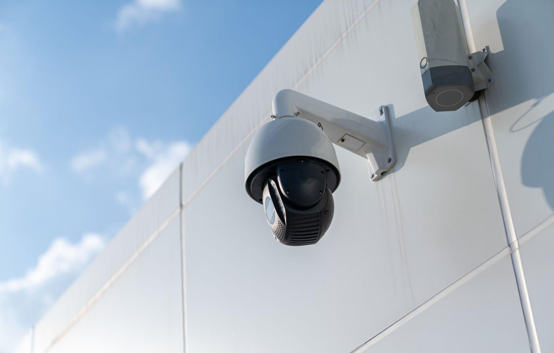 Outdoor CCTV camera in a wall. Outdoor CCTV camera in a wall.