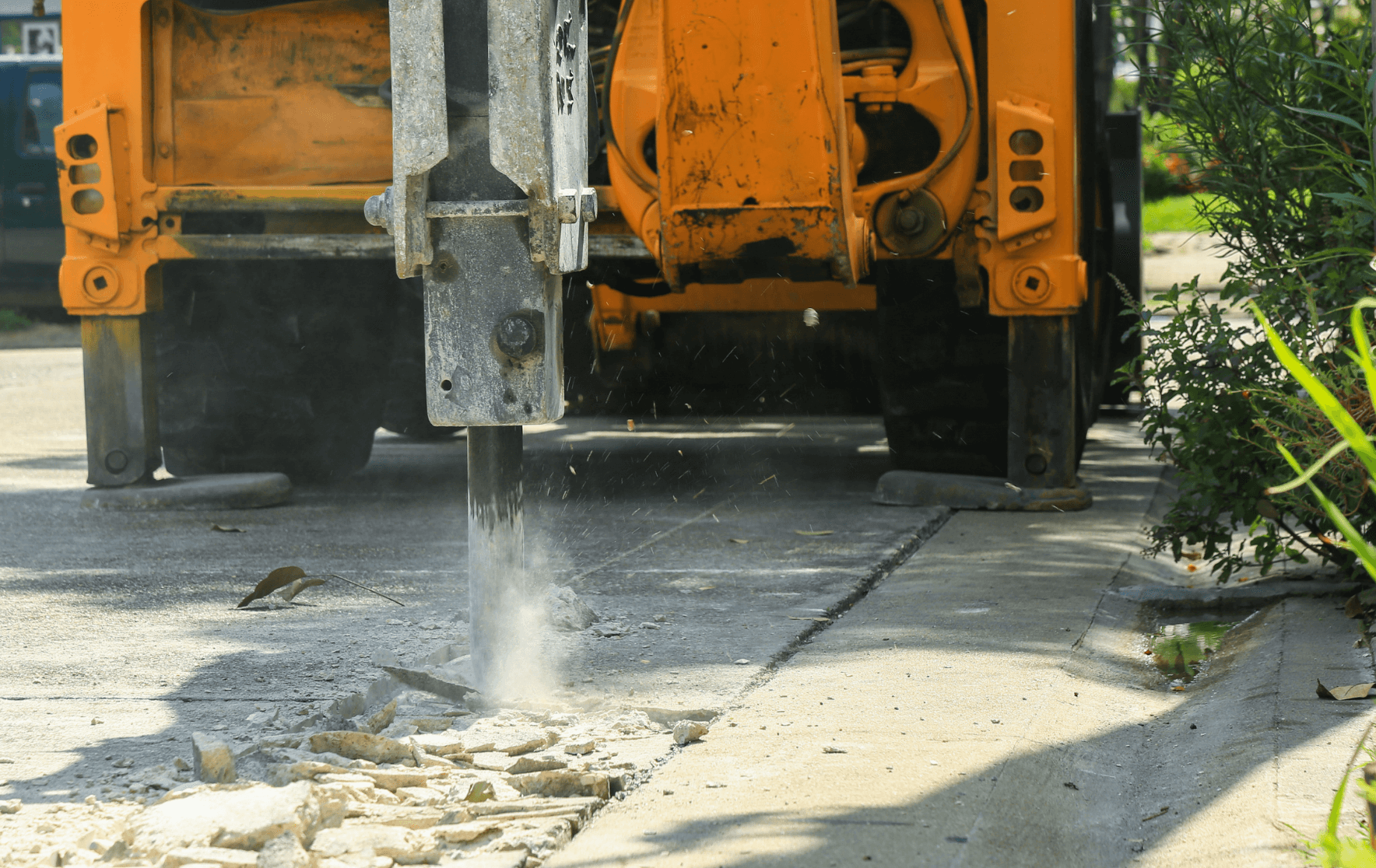 excavation removing old concrete