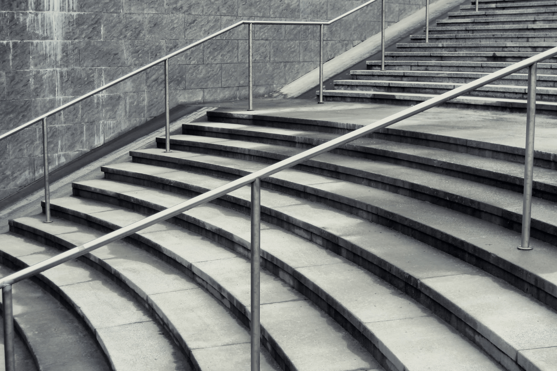 gray concrete steps with railing