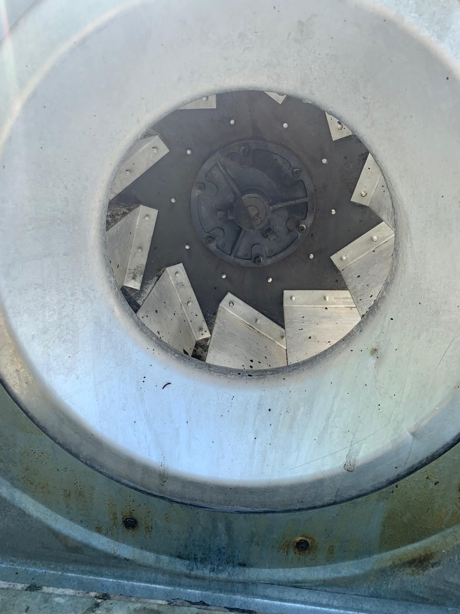 A close up of a fan with a hole in the middle.