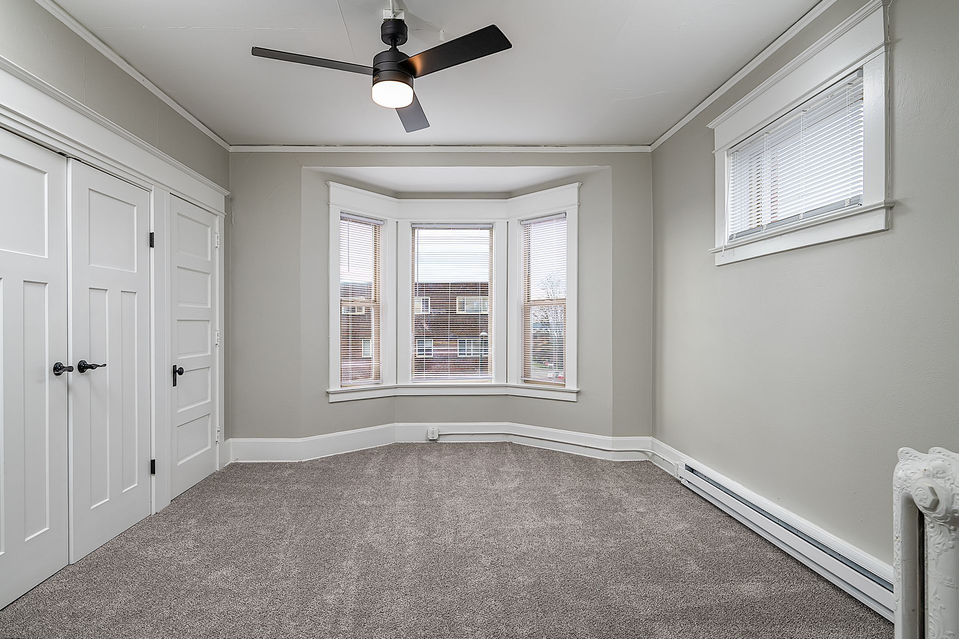 Photo showing a room with plenty of closet space and natural lighting