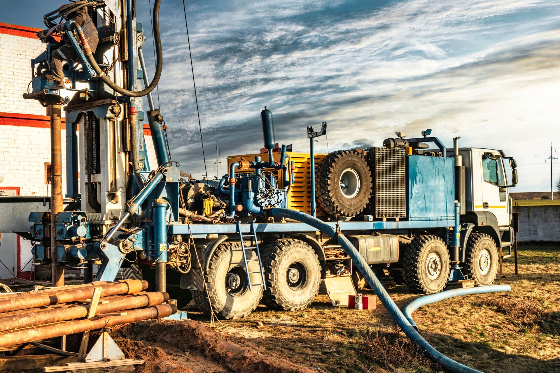 Drilling rig on a truck at a construction site
