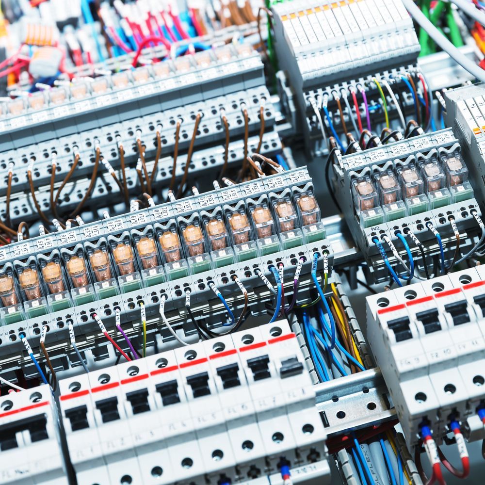 Close-up of an Electrical Panel With Wires, Breakers, and Terminals in Various Colours — FAW Electrical in Sussex Inlet, NSW