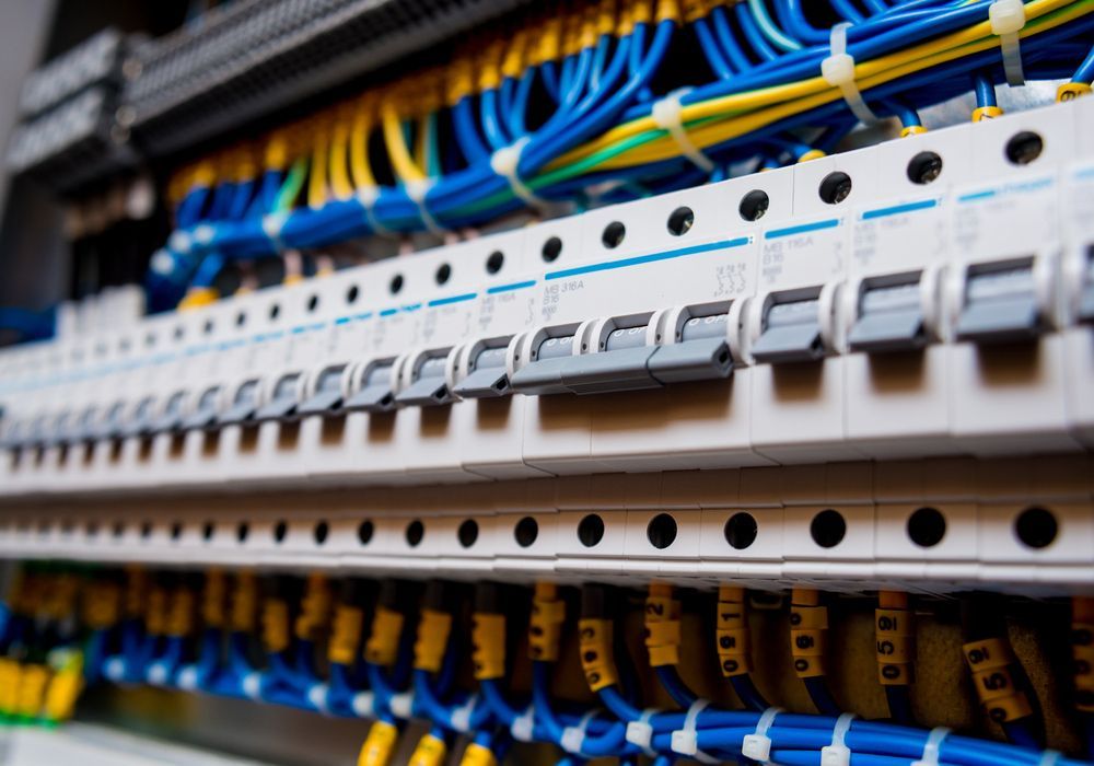 Electrical Panel With Blue, Yellow, and White Wires — FAW Electrical in St Georges Basin, NSW