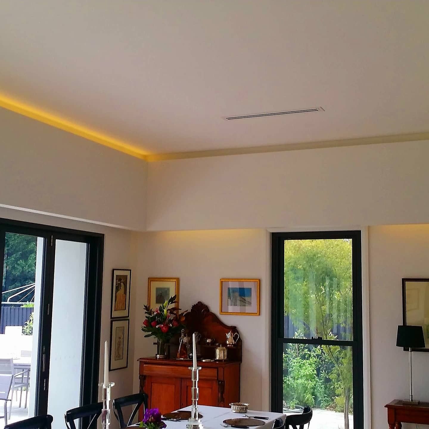 Dining Room Interior, With Art, Table Set for Meal — FAW Electrical in Berry, NSW