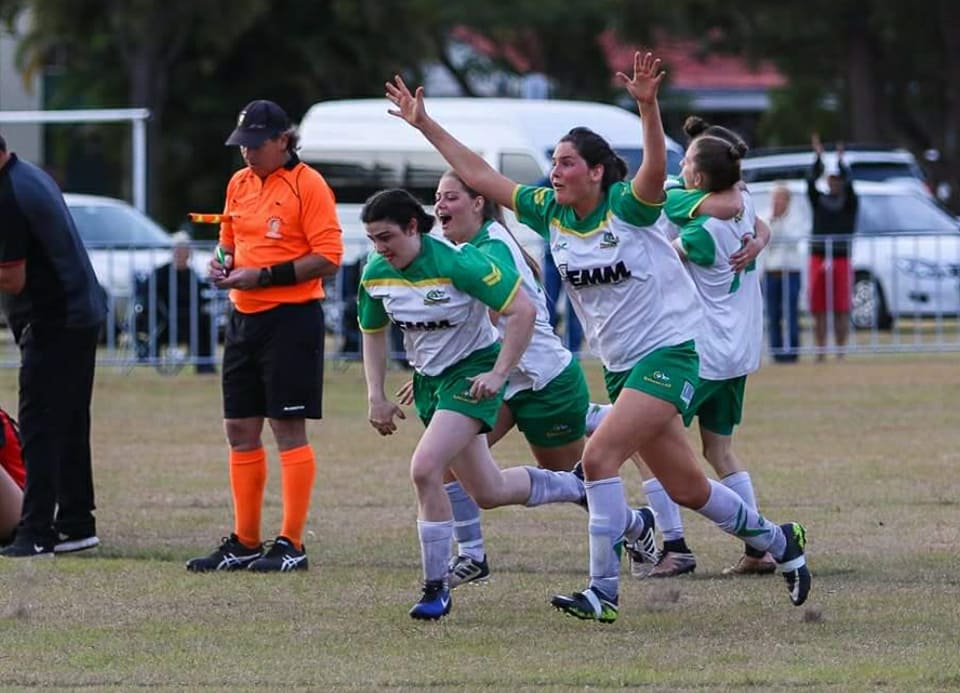 Football Players Running — Football Clubs in Kingscliff, NSW