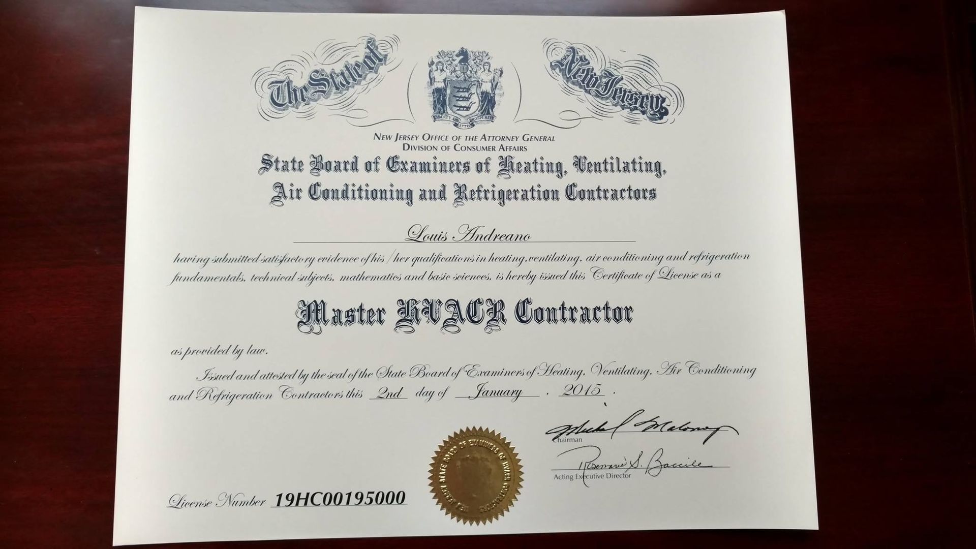 A certificate from the State Board for HVAC Contractors, with blue text and a gold seal.