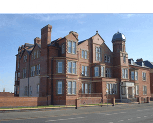 A picture showing the outside of Marina Apartments