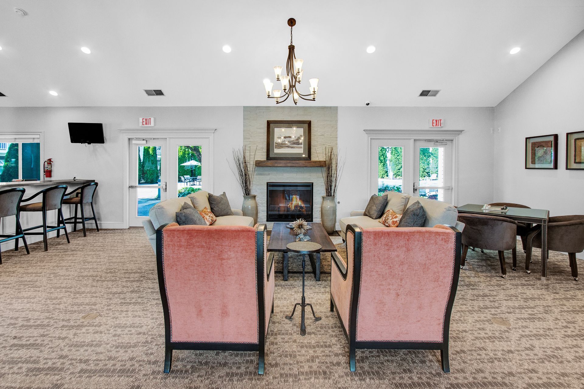 A living room filled with furniture and a fireplace.