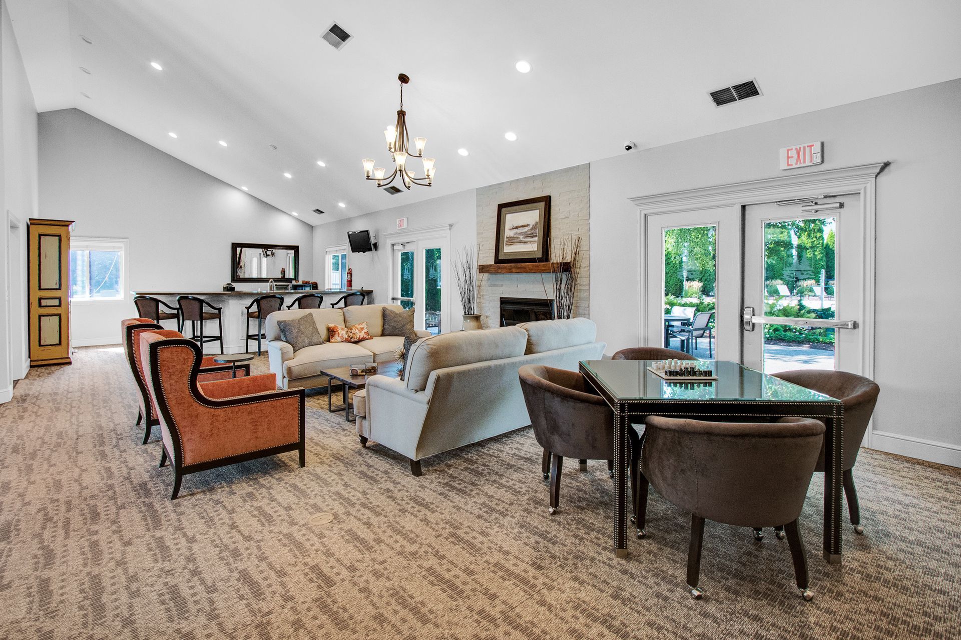 A living room filled with furniture and a table.