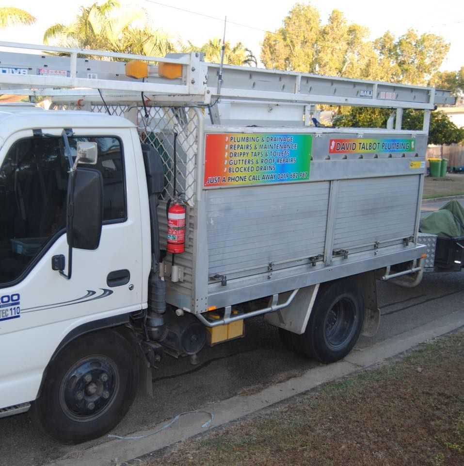 White Service Truck With Ladder Rack Toolbox — David Talbot Plumbing in Cranbrook, QLD