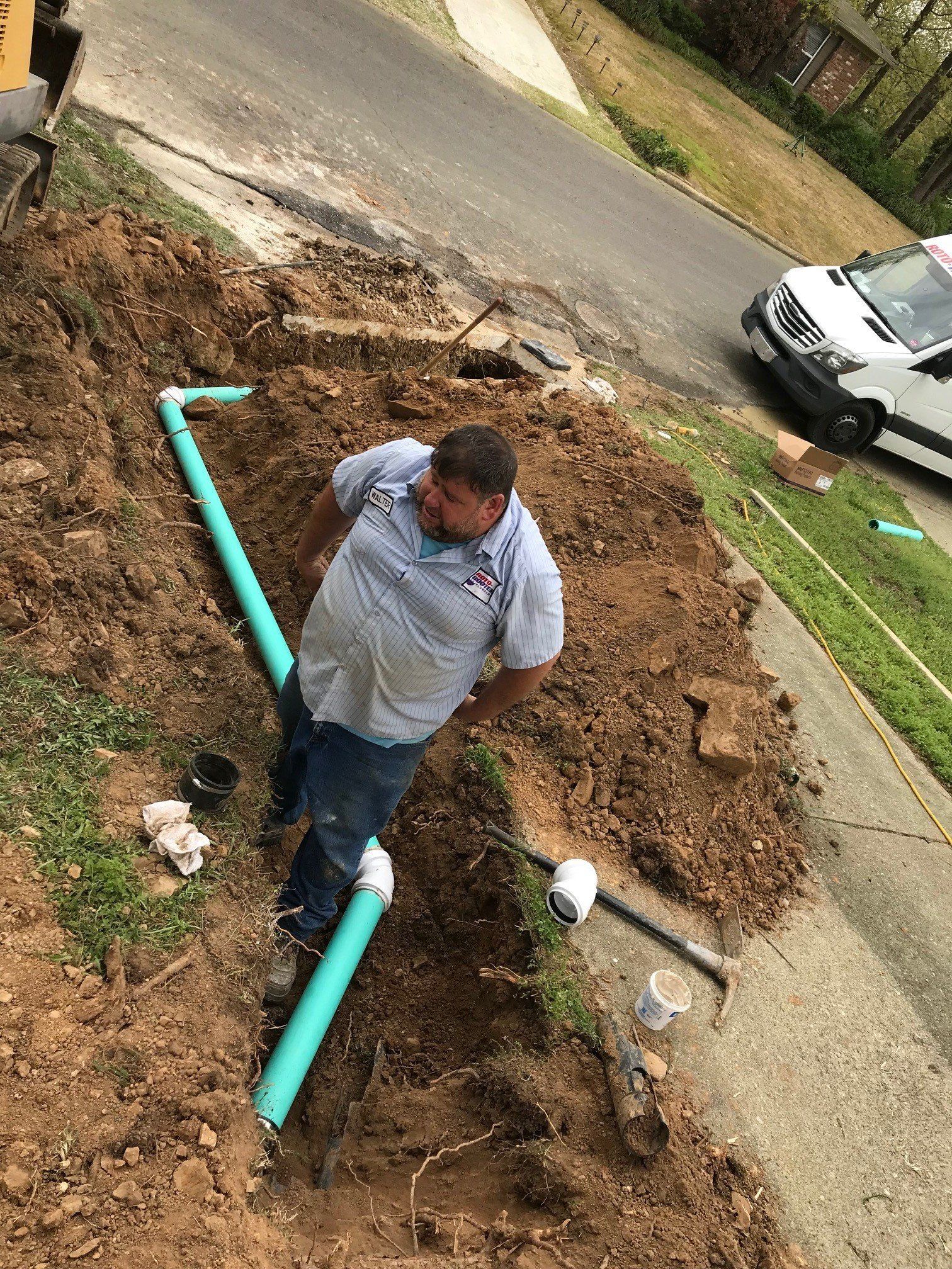 Sewern Line Repair — Installing Pipe Under The Ground in Hot Springs, AR