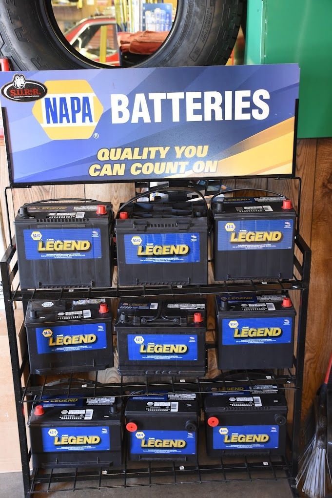 A display of napa batteries in a store