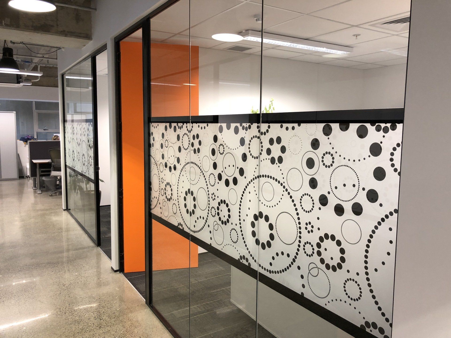 Digitally printed window etch films applied to office glazing