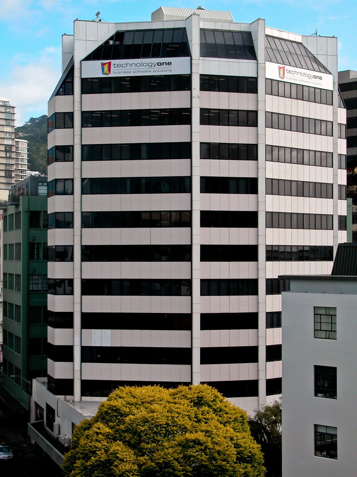 ACM signs installed onto building