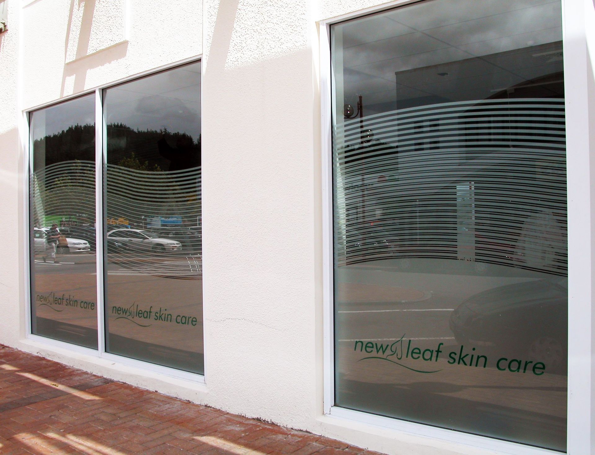 Window etch film and computer cut vinyls applied to windows